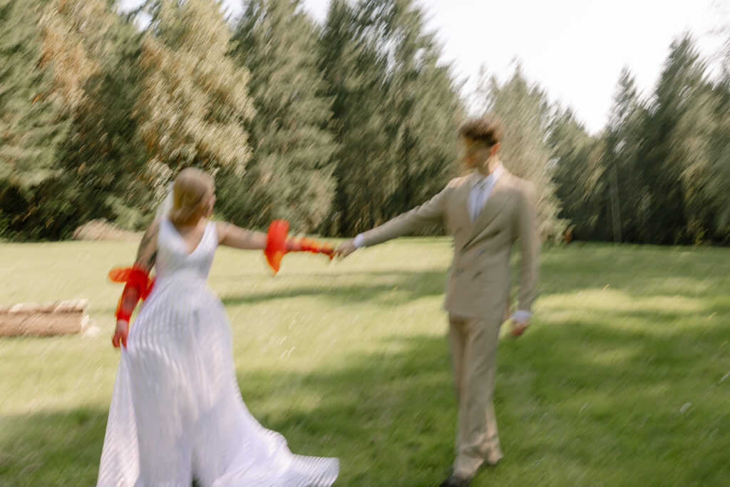An editorial photo of a bride & groom at their whimsical Vashon, WA wedding taken by washington state wedding photographers