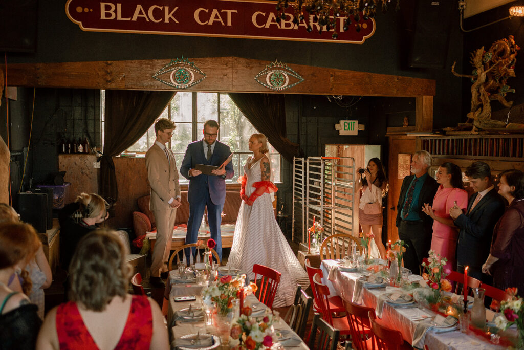 A bride & groom are photographed at their wedding reception held at snapdragon vashon