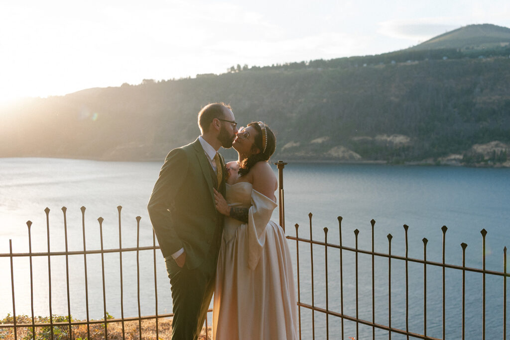 Newlyweds share a kiss at their columbia gorge wedding