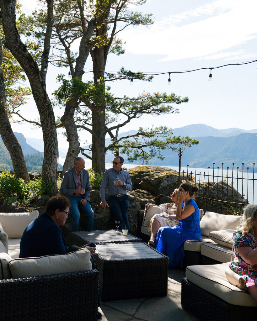 Wedding guests enjoy cocktail hour at the griffin house hood river