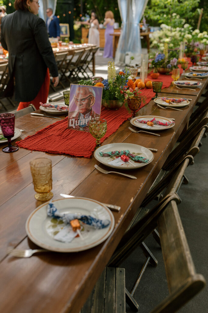 Whimsical table decor is dispalyed at a a griffin house hood river wedding reception 