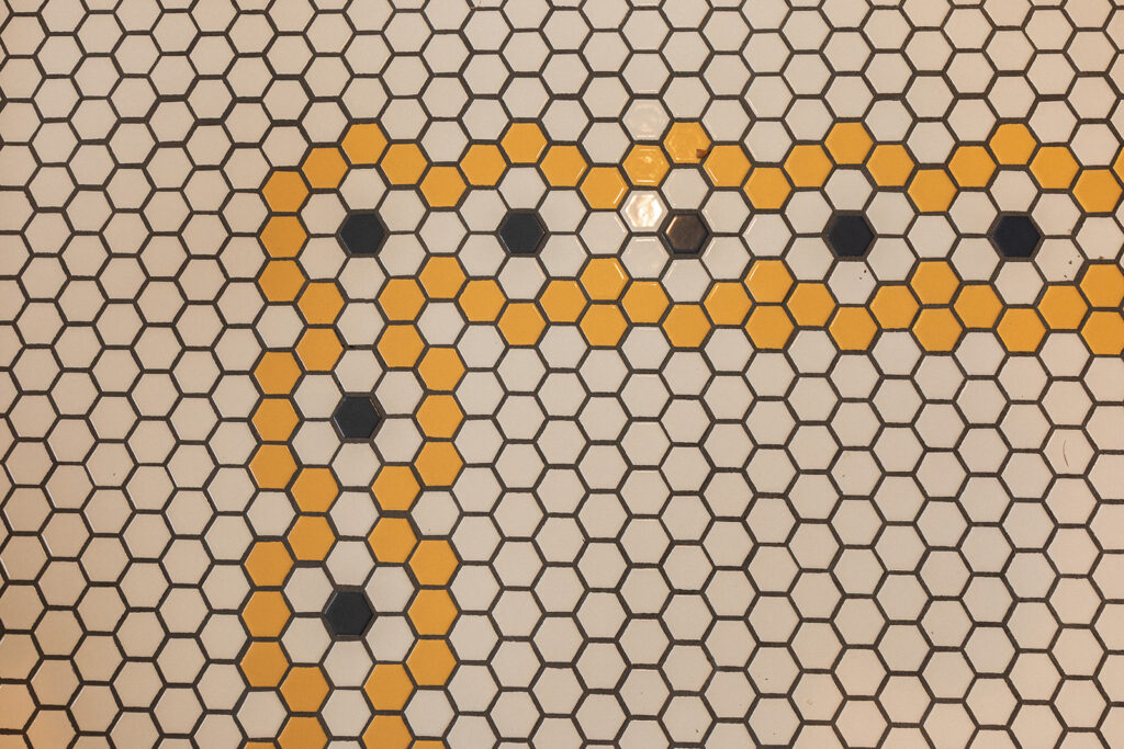 Art deco inspired hexagonal tiles are photographed at a wedding at The Tokeland Hotel and Restaurant in Tokeland WA