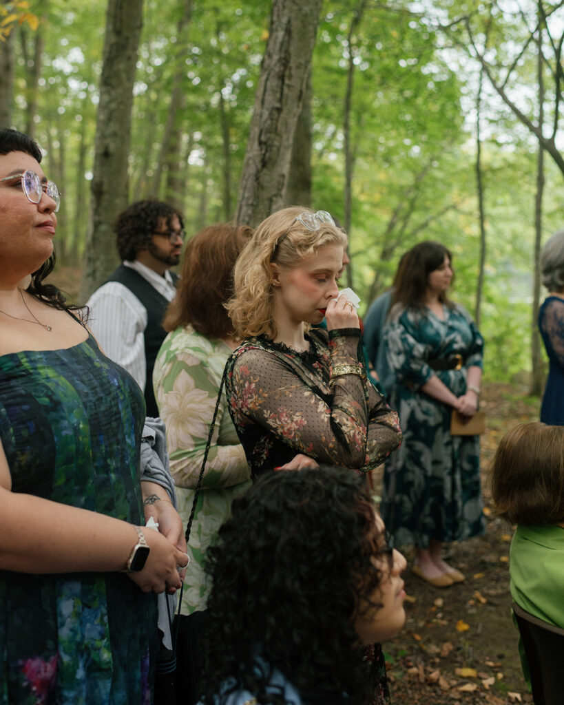Guests at a NY wedding held at mountain lakes park north salem ny get emotional as two brides exchange vows 