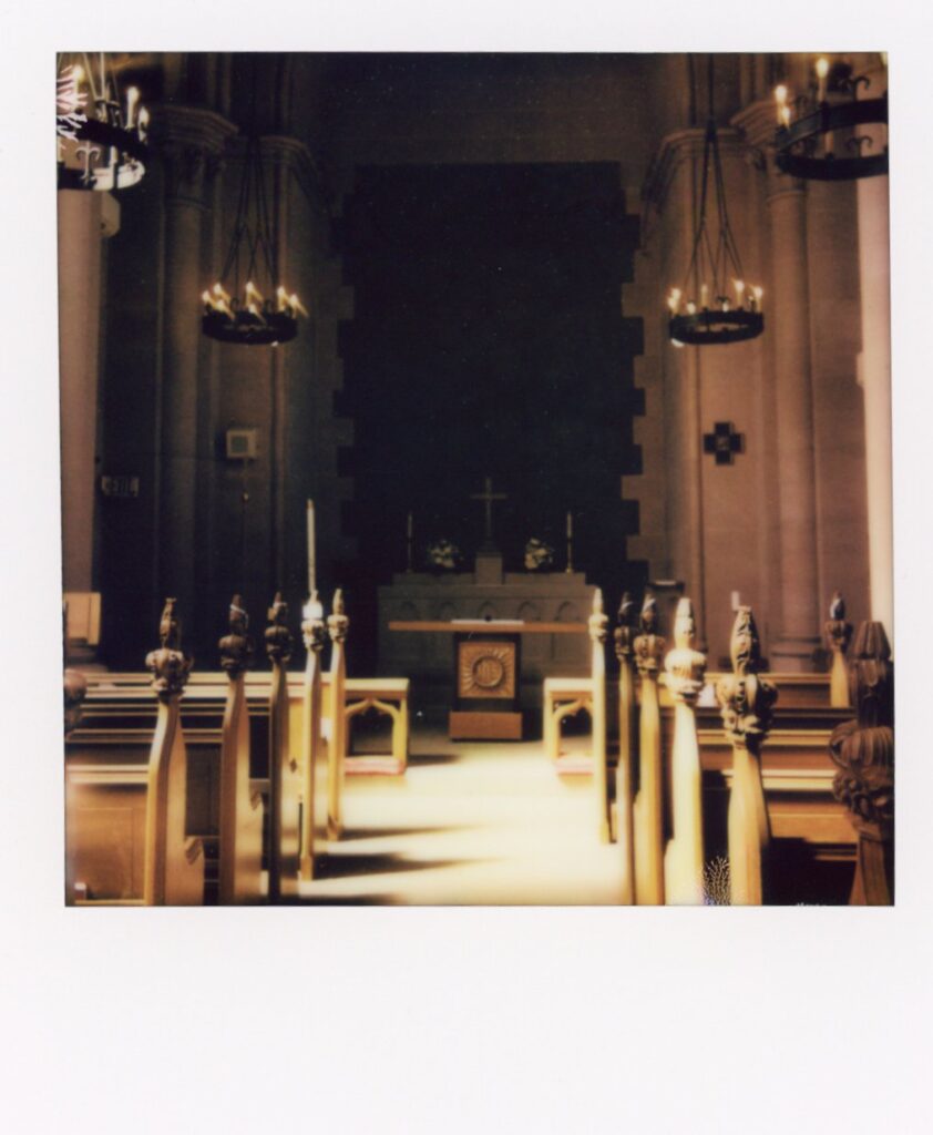 The sanctuary at St. Mark's Episcopal church is photographed on instant film at a Seattle wedding 