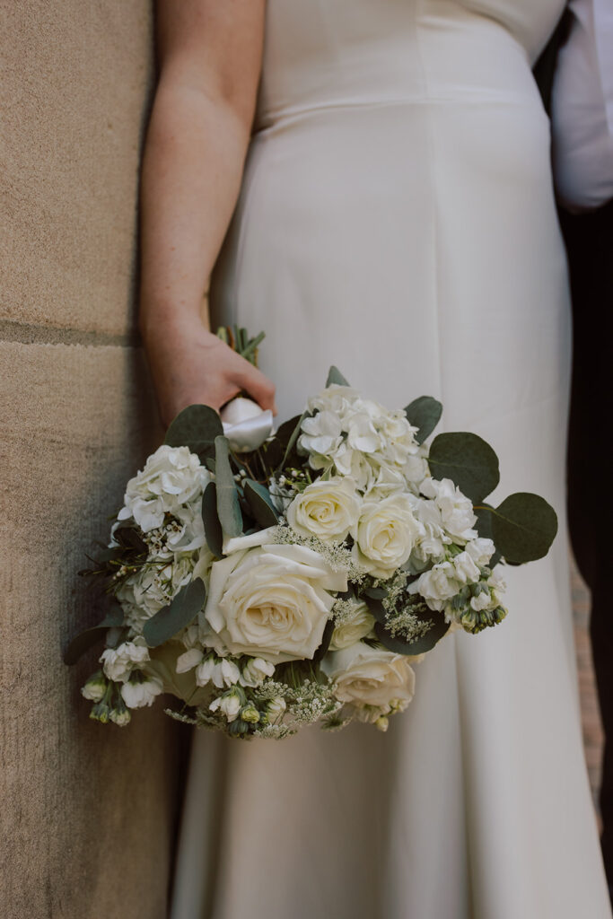 A white bridal bouquet designed by a Seattle florist 
